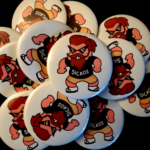 Stack of Sicko Vaush Buttons