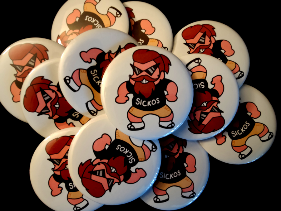 Stack of Sicko Vaush Buttons