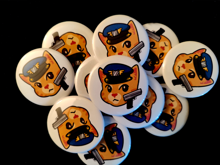 Stack of ArtCop Buttons